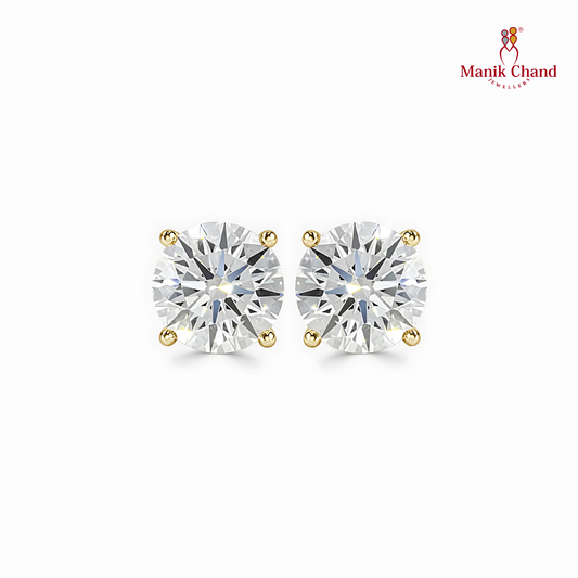 Round One Carat Diamond Stud Earrings In Yellow Gold