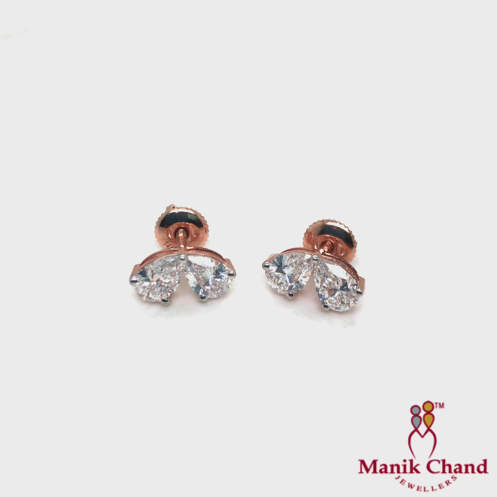Sparkling Pear Cut Diamond bow Tops